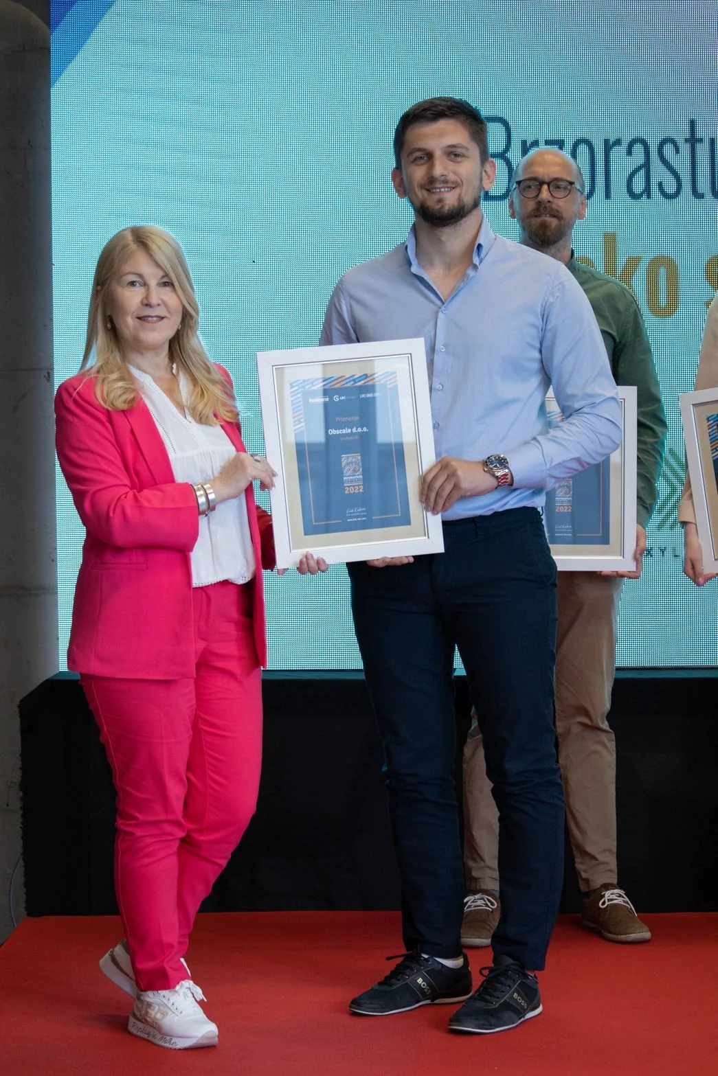 The Obscale recognition being presented on stage at the Fast-growing Companies ceremony